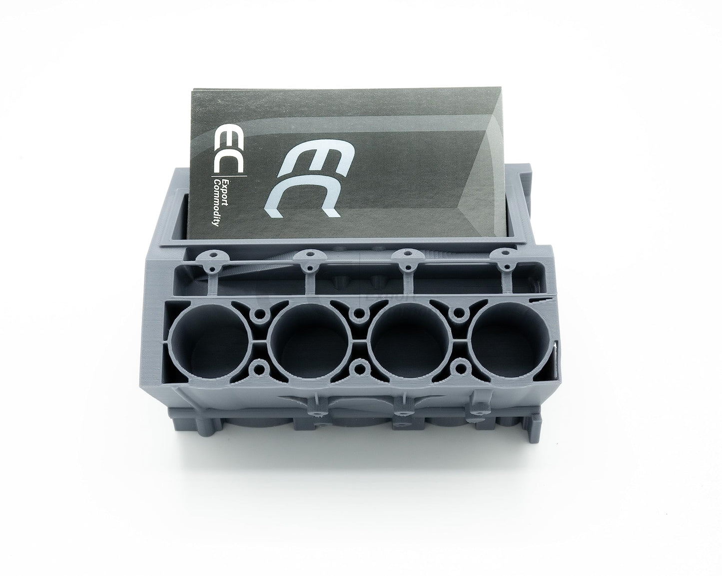 Revved-Up Organizer: 3D Printed Engine Block Business Card Holder - Your Desk's Powerhouse - GoodBuy.ai