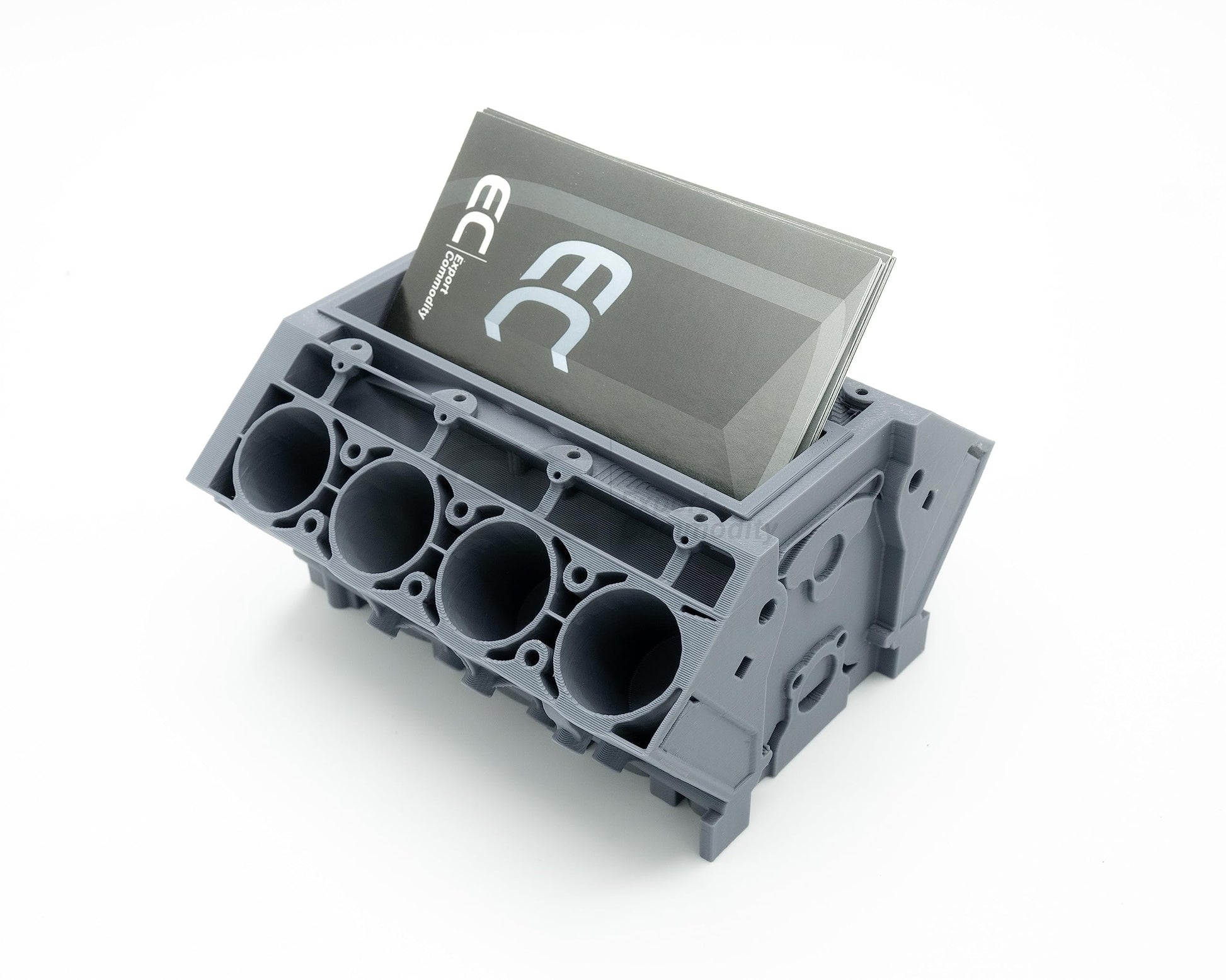 Revved-Up Organizer: 3D Printed Engine Block Business Card Holder - Your Desk's Powerhouse - GoodBuy.ai