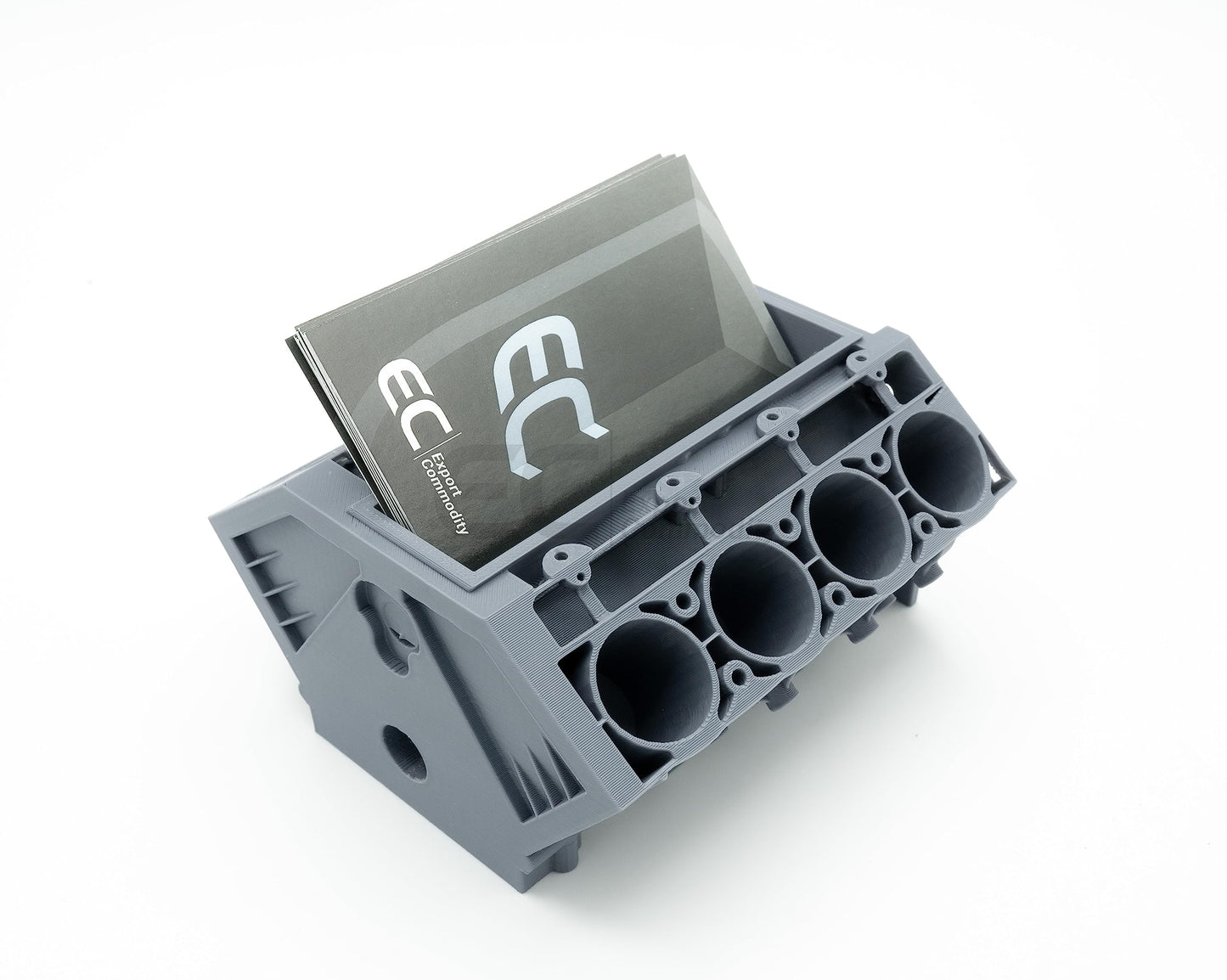 Revved-Up Organizer: 3D Printed Engine Block Business Card Holder - Your Desk's Powerhouse - GoodBuy.ai