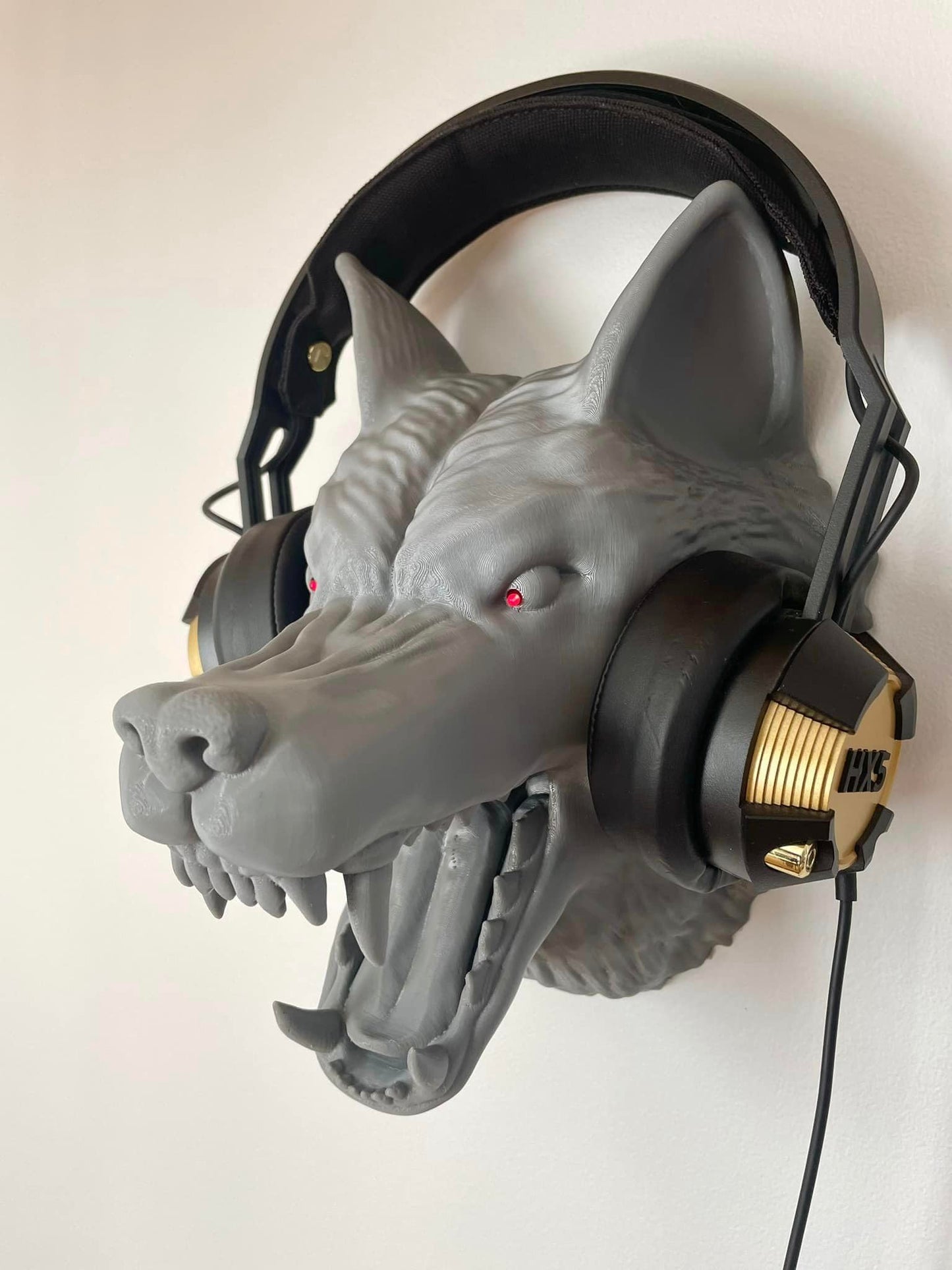 Lone Wolf Wall Companion: 3D Printed Wolf Head Wall Mount with Illuminating Red Eyes - GoodBuy.ai